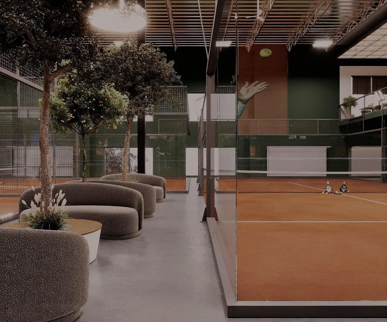 The social lounge and café area overlooking the courts at Padel Model