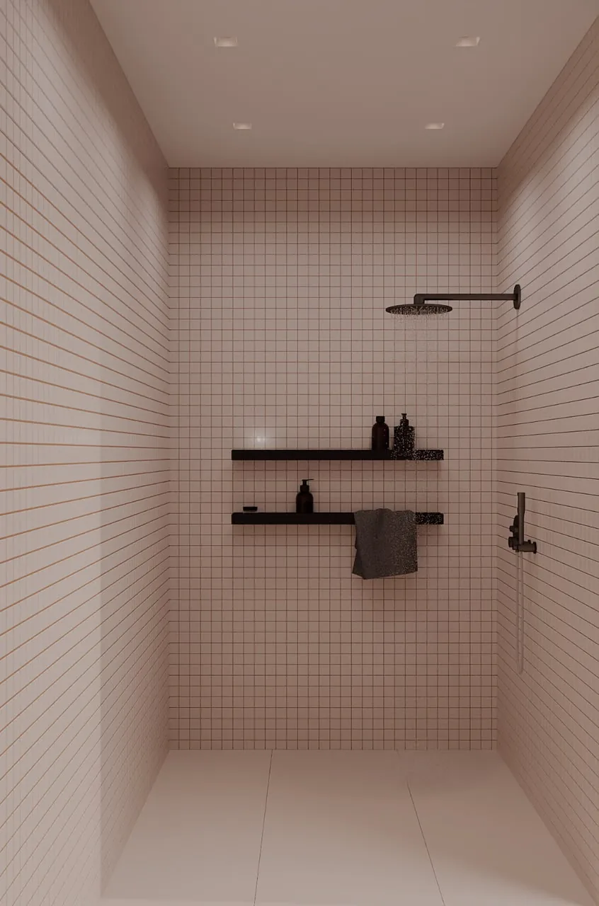 A private tiled shower with a rainfall head and folded towel at Padel Model